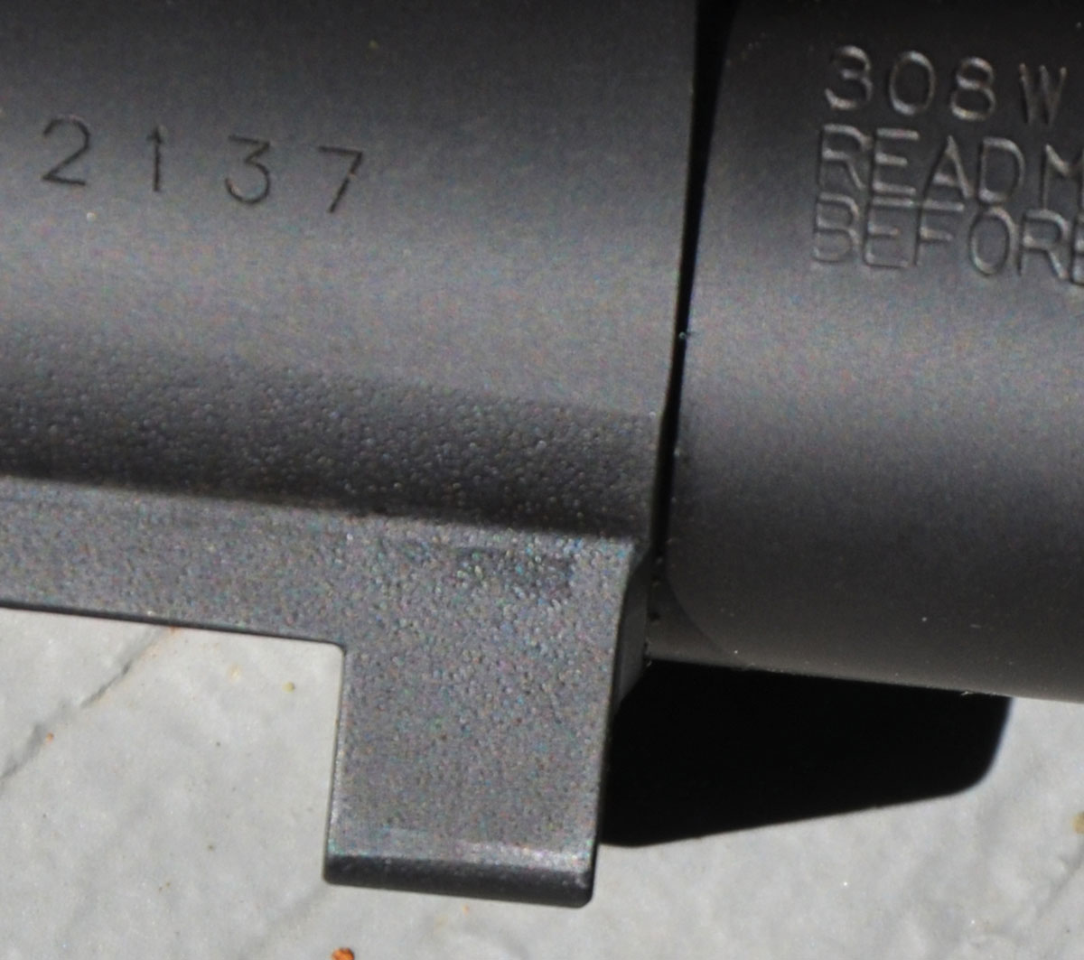 The recoil lugs of many rifles of the past, including the 1898 Mauser, 1903 Springfield, Remington Model 30 and Winchester Model 70 were forged as an integral part of the receiver rather than added on. The Superlite, shown here, has that type of recoil lug.